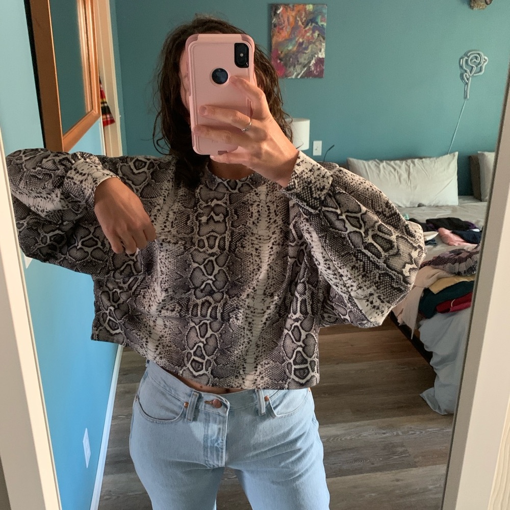 Take a walk on the wild side with this python pattern shirt 🐍